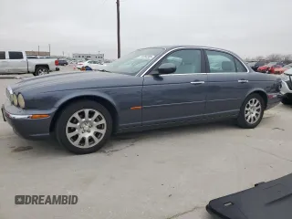 2004 Jaguar XJ with VIN SAJWA71C04SG22878, listed as a Copart auction lot 44383205 with 127,515 mi miles and Clean Title. Bid and sale history available at carsss.com. Image 1.