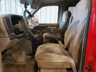 2000 Chevrolet Chevy Van z VIN 1GBFG15M4Y1211137, wystawiony jako Copart lot #75990404 z przebiegiem 137 181 mil mil oraz Nie do naprawy • Non repairable. Historia ofert i sprzedaży dostępna na DreamBid. Obrazek 7.