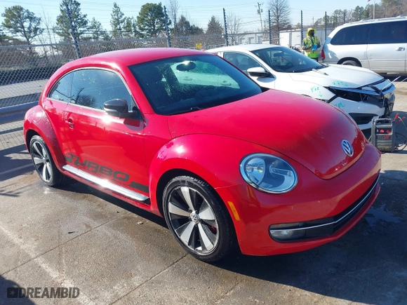 2012 Volkswagen Beetle 2.0T Turbo w/Sun/Sound with VIN 3VWV67ATXCM650376, listed as a IAAI auction lot 41315431 with 104,523 mi miles. Bid and sale history available at carsss.com. Image 1.