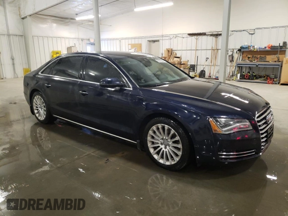 2014 Audi A8 4.0T with VIN WAUR2AFD8EN006198, listed as a Copart auction lot 85272544 with 105,058 mi miles and Salvage Title. Bid and sale history available at DreamBid. Image 4.