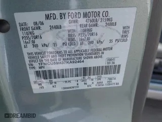 2007 Ford Escape Hybrid with VIN 1FMCU59H37KA92464, listed as a IAAI auction lot 42001479 with 159,147 mi miles. Bid and sale history available at carsss.com. Image 9.
