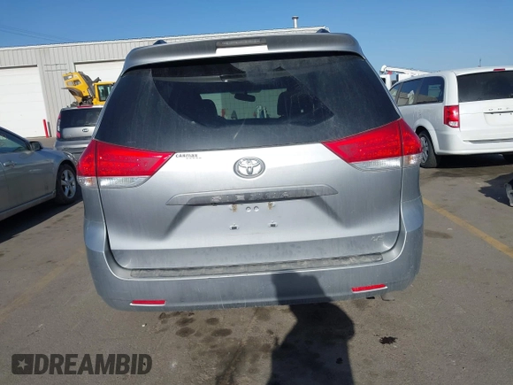 2013 Toyota Sienna LE AAS with VIN 5TDKK3DC6DS371126, listed as a IAAI auction lot 42006353 with 141,425 mi miles. Bid and sale history available at carsss.com. Image 16.