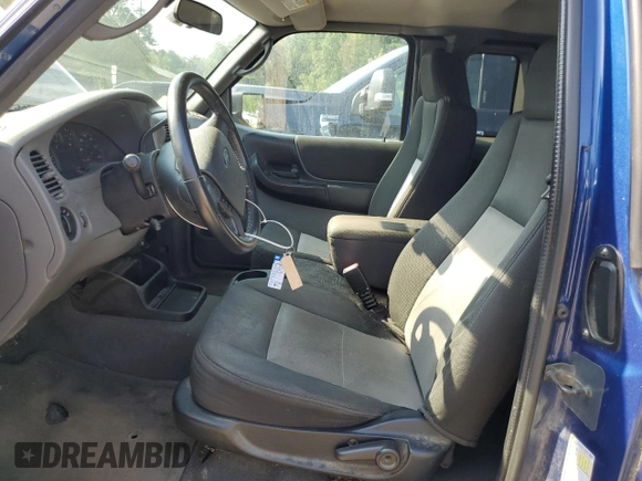 2009 Ford Ranger XLT with VIN 1FTZR45EX9PA64205, listed as a Copart auction lot 64789075 with 157,477 mi miles and Clean title. Bid and sale history available at DreamBid. Image 7.