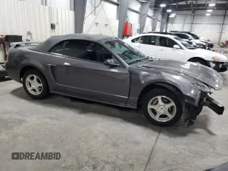 2003 Ford Mustang Deluxe z VIN 1FAFP44433F369534, wystawiony jako Copart lot #76606794 z przebiegiem 88 503 mil mil oraz Szkoda całkowita • Salvage title. Historia ofert i sprzedaży dostępna na DreamBid. Obrazek 4.