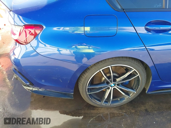 2020 BMW 3 Series M340i xDrive with VIN WBA5U9C06LFH24903, listed as a IAAI auction lot 41041530 with 55,949 mi miles and . Bid and sale history available at DreamBid. Image 13.