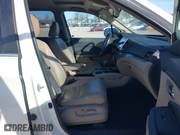 2016 Honda Pilot EX-L with VIN 5FNYF5H5XGB016152, listed as a IAAI auction lot 41820023 with 210,474 mi miles and . Bid and sale history available at DreamBid. Image 5.