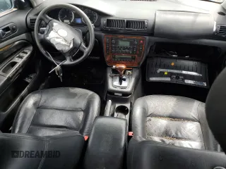 2004 Volkswagen Passat GLX with VIN WVWRH63B84P107858, listed as a Copart auction lot 62022524 with 141,500 mi miles and Salvage title. Bid and sale history available at DreamBid. Image 8.