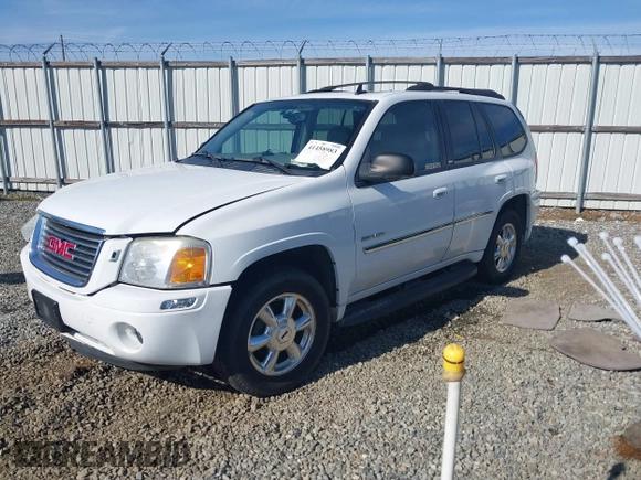 2006 GMC Envoy SLT with VIN 1GKDS13S062128531, listed as a IAAI auction lot 41458983 with 119,385 mi miles. Bid and sale history available at carsss.com. Image 17.