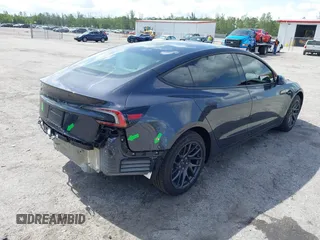 2025 Tesla Model 3 Long Range with VIN 5YJ3E1EA7SF940208, listed as a IAAI auction lot 42433793 with 1,983 mi miles and . Bid and sale history available at DreamBid. Image 4.