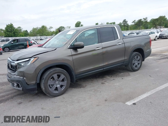 2020 Honda Ridgeline RTL-E with VIN 5FPYK3F78LB001882, listed as a IAAI auction lot 42352980 with 63,278 mi miles and . Bid and sale history available at DreamBid. Image 18.