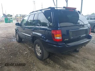 2000 Jeep Grand Cherokee Limited with VIN 1J4GW58S9YC347699, listed as a IAAI auction lot 42545373 with 118,566 mi miles and . Bid and sale history available at DreamBid. Image 3.