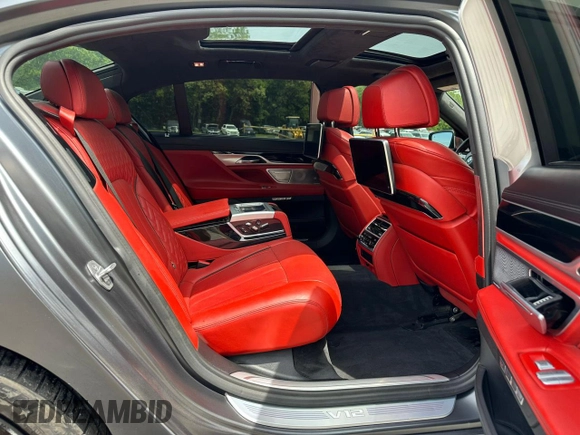 2018 BMW 7 Series M760i xDrive with VIN WBA7H6C54JG614931, listed as a Copart auction lot 59110125 with 71,953 mi miles and Clean title. Bid and sale history available at DreamBid. Image 5.