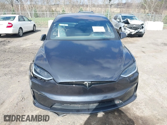 2023 Tesla Model X with VIN 7SAXCDE52PF425834, listed as a IAAI auction lot 41996298 with Not Provided miles and . Bid and sale history available at DreamBid. Image 11.