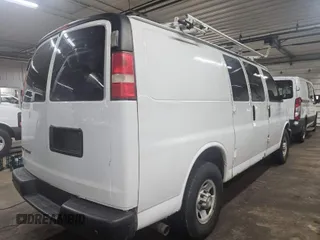 2014 Chevrolet Express Cargo Van with VIN 1GCWGFCA1E1198246, listed as a IAAI auction lot 42091597 with 231,987 mi miles. Bid and sale history available at carsss.com. Image 1.