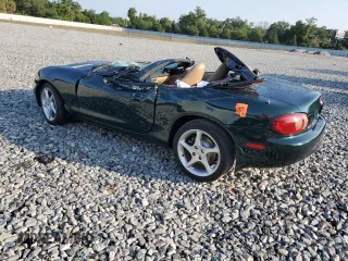 2002 Mazda MX-5 Miata Cloth with VIN JM1NB353X20231155, listed as a Copart auction lot 55805865 with Not provided miles and Salvage title. Bid and sale history available at DreamBid. Image 2.