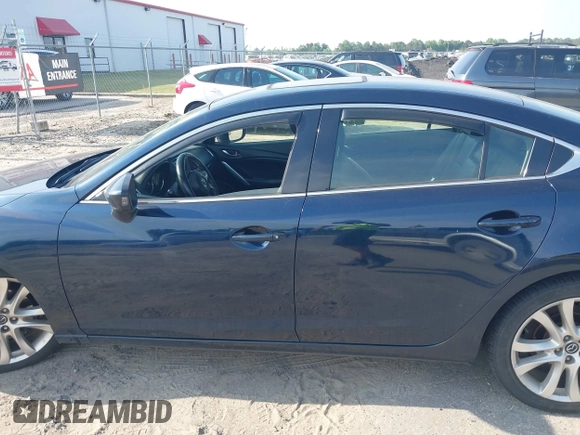 2015 Mazda 6 i Touring with VIN JM1GJ1V57F1183910, listed as a IAAI auction lot 42158716 with 234,765 mi miles. Bid and sale history available at carsss.com. Image 14.