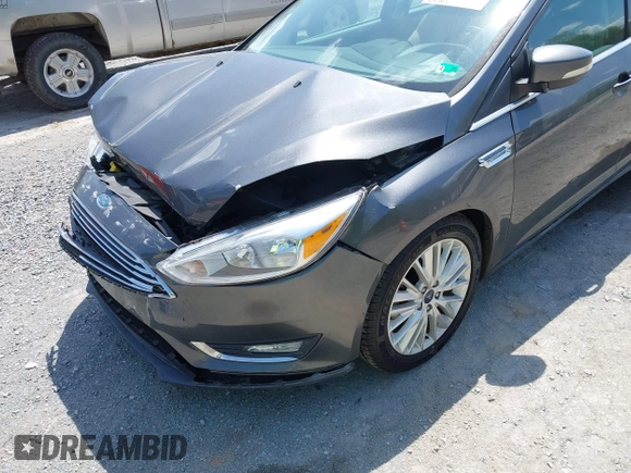 2018 Ford Focus Titanium с VIN 1FADP3J22JL314642, выставлен на аукционе IAAI как лот 42128194 с пробегом 62 787 миль миль и . История ставок и продаж доступна на DreamBid. Изображение 17.