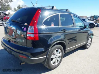 2009 Honda CR-V EX-L with VIN 5J6RE38759L023937, listed as a IAAI auction lot 41736422 with 137,577 mi miles. Bid and sale history available at carsss.com. Image 4.
