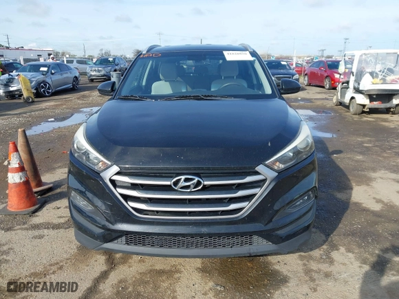 2017 Hyundai Tucson SE Plus with VIN KM8J33A41HU327540, listed as a IAAI auction lot 41820850 with 129,227 mi miles. Bid and sale history available at carsss.com. Image 12.