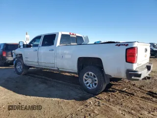 2019 Chevrolet Silverado 3500HD LTZ z VIN 1GC4KXCY0KF276409, wystawiony jako Copart lot #88408515 z przebiegiem 125 787 mil mil oraz Szkody całkowita. Historia ofert i sprzedaży dostępna na DreamBid. Obrazek 2.
