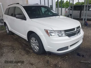 2017 Dodge Journey SE z VIN 3C4PDCAB8HT608108, wystawiony jako IAAI lot #42320810 z przebiegiem 134 570 mil mil oraz . Historia ofert i sprzedaży dostępna na DreamBid. Obrazek 1.