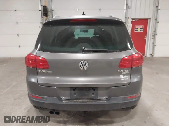 2012 Volkswagen Tiguan S with VIN WVGBV7AX2CW002991, listed as a IAAI auction lot 42031877 with 205,979 mi miles and . Bid and sale history available at DreamBid. Image 16.