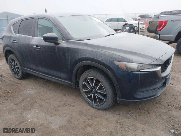 2018 Mazda CX-5 Touring with VIN JM3KFBCM3J0457279, listed as a IAAI auction lot 41021262 with 1 mi miles. Bid and sale history available at carsss.com. Image 1.