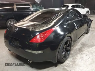 2005 Nissan 350Z Touring with VIN JN1AZ34E45M653631, listed as a IAAI auction lot 41689560 with 147,635 mi miles. Bid and sale history available at carsss.com. Image 4.