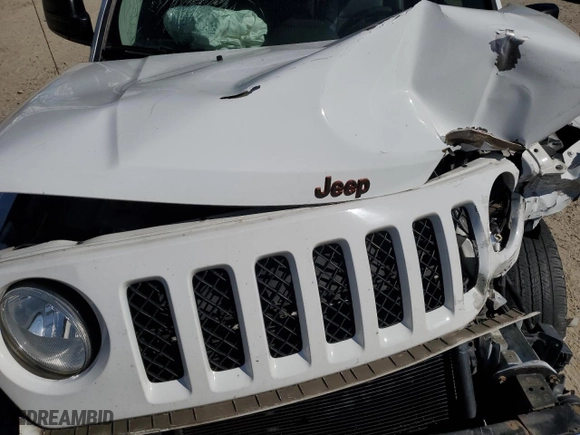 2016 Jeep Patriot 75th Anniversary with VIN 1C4NJRBB2GD697812, listed as a Copart auction lot 77008604 with 0 mi miles and Salvage Title. Bid and sale history available at carsss.com. Image 13.