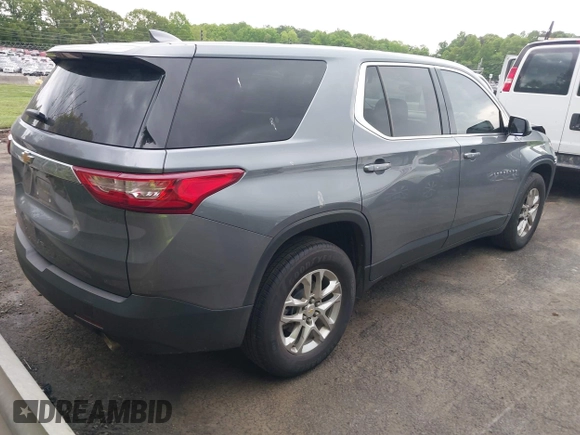 2020 Chevrolet Traverse LS with VIN 1GNERFKW5LJ245009, listed as a IAAI auction lot 42029854 with 77,771 mi miles and . Bid and sale history available at DreamBid. Image 4.