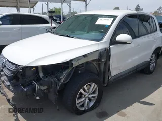 2014 Volkswagen Tiguan SEL with VIN WVGAV3AX0EW524669, listed as a IAAI auction lot 42289003 with 94,513 mi miles and . Bid and sale history available at DreamBid. Image 6.