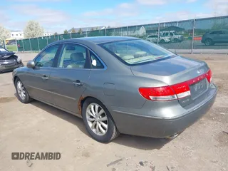 2006 Hyundai Azera SE with VIN KMHFC46F26A132762, listed as a IAAI auction lot 42142152 with 165,673 mi miles and . Bid and sale history available at DreamBid. Image 3.