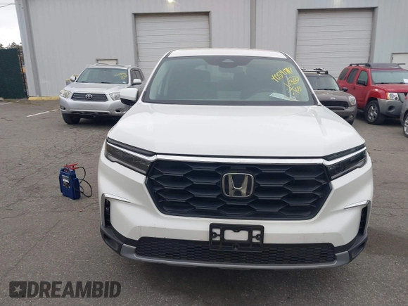 2023 Honda Pilot EX-L with VIN 5FNYG1H58PB016138, listed as a IAAI auction lot 40591717 with 10,068 mi miles and . Bid and sale history available at DreamBid. Image 12.