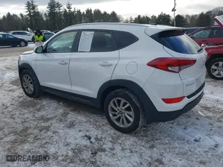 2016 Hyundai Tucson SE with VIN KM8J3CA44GU254260, listed as a IAAI auction lot 41328567 with 124,554 mi miles. Bid and sale history available at carsss.com. Image 3.