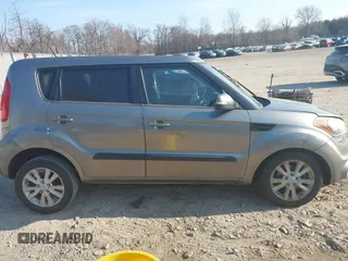2012 Kia Soul + with VIN KNDJT2A68C7370716, listed as a IAAI auction lot 41726118 with 107,688 mi miles. Bid and sale history available at carsss.com. Image 13.