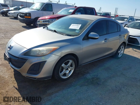 2011 Mazda 3 i Sport with VIN JM1BL1UF4B1434455, listed as a IAAI auction lot 42195864 with 127,556 mi miles and . Bid and sale history available at DreamBid. Image 2.