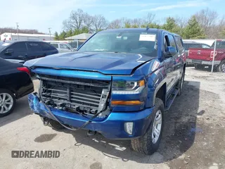 2017 Chevrolet Silverado 1500 LT with VIN 3GCUKREC5HG363503, listed as a IAAI auction lot 41833304 with 133,130 mi miles and . Bid and sale history available at DreamBid. Image 16.