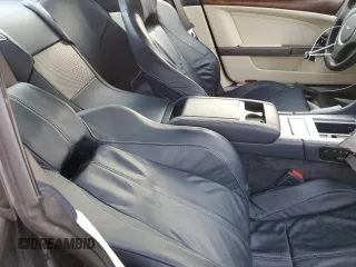 2009 Aston Martin DB9 z VIN SCFAD01E79GA12139, wystawiony jako Copart lot #76241164 z przebiegiem Nie podano mil oraz Szkody całkowita. Historia ofert i sprzedaży dostępna na DreamBid. Obrazek 10.