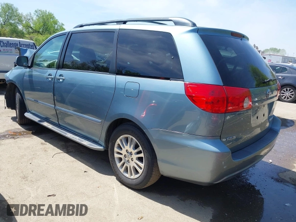 2009 Toyota Sienna XLE with VIN 5TDZK22C99S239755, listed as a IAAI auction lot 42096411 with 214,983 mi miles. Bid and sale history available at carsss.com. Image 3.