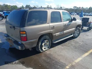 2004 Chevrolet Tahoe LT with VIN 1GNEC13Z24J170834, listed as a IAAI auction lot 41149637 with 362,679 mi miles and . Bid and sale history available at DreamBid. Image 4.