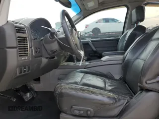 2004 Nissan Titan LE with VIN 1N6AA07A74N516071, listed as a Copart auction lot 87472284 with 140,011 mi miles and Salvage Title. Bid and sale history available at DreamBid. Image 7.