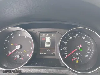 2018 Volkswagen Passat 2.0T SE with VIN 1VWBA7A35JC018885, listed as a IAAI auction lot 41955324 with 107,046 mi miles. Bid and sale history available at carsss.com. Image 7.
