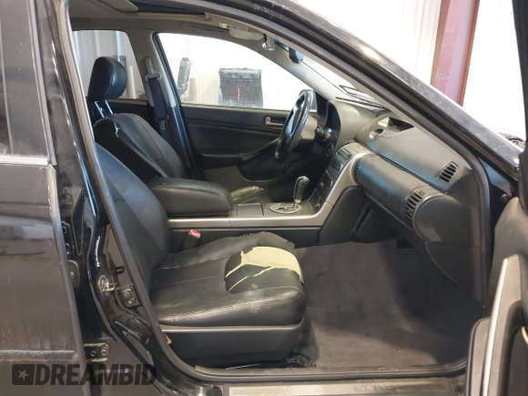 2003 Infiniti G35 w/Leather with VIN JNKCV51E53M304703, listed as a IAAI auction lot 41470321 with 227,894 mi miles. Bid and sale history available at carsss.com. Image 5.