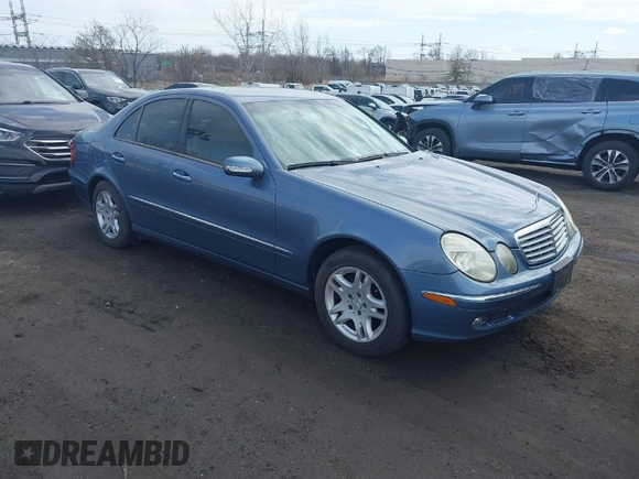2003 Mercedes-Benz E-Class 3.2L with VIN WDBUF65J43A232053, listed as a IAAI auction lot 41930685 with 74,675 mi miles. Bid and sale history available at carsss.com. Image 1.