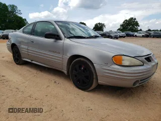 1999 Pontiac Grand Am z VIN 1G2NE12E3XM901263, wystawiony jako Copart lot #55723445 z przebiegiem 163 946 mil mil oraz Szkoda całkowita • Salvage title. Historia ofert i sprzedaży dostępna na DreamBid. Obrazek 4.