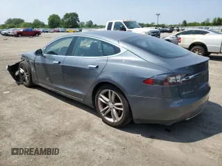 2013 Tesla Model S with VIN 5YJSA1AG9DFP04910, listed as a Copart auction lot 60827335 with 97,022 mi miles and Salvage title. Bid and sale history available at DreamBid. Image 2.