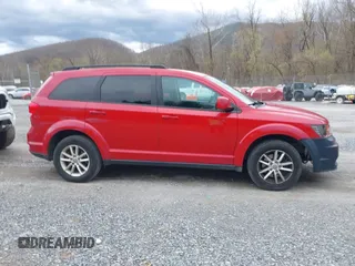 2017 Dodge Journey SXT with VIN 3C4PDDBG9HT528879, listed as a IAAI auction lot 41890261 with 156,661 mi miles and . Bid and sale history available at DreamBid. Image 13.