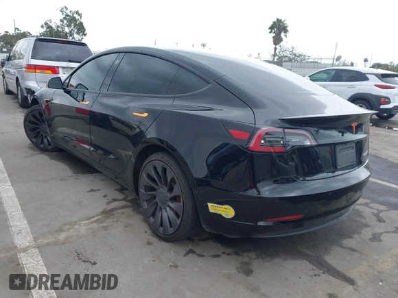 2022 Tesla Model 3 Performance with VIN 5YJ3E1EC3NF248534, listed as a IAAI auction lot 41882694 with 55,415 mi miles and . Bid and sale history available at carsss.com. Image 3.