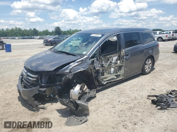 2014 Honda Odyssey EX-L with VIN 5FNRL5H62EB112280, listed as a Copart auction lot 60138645 with 167,657 mi miles and Salvage title. Bid and sale history available at DreamBid. Image 1.