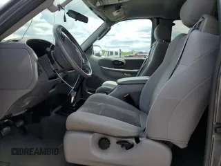 2004 Ford F-150 XL with VIN 2FTRX17274CA98376, listed as a Copart auction lot 56300585 with 71,767 mi miles and Salvage title. Bid and sale history available at DreamBid. Image 7.